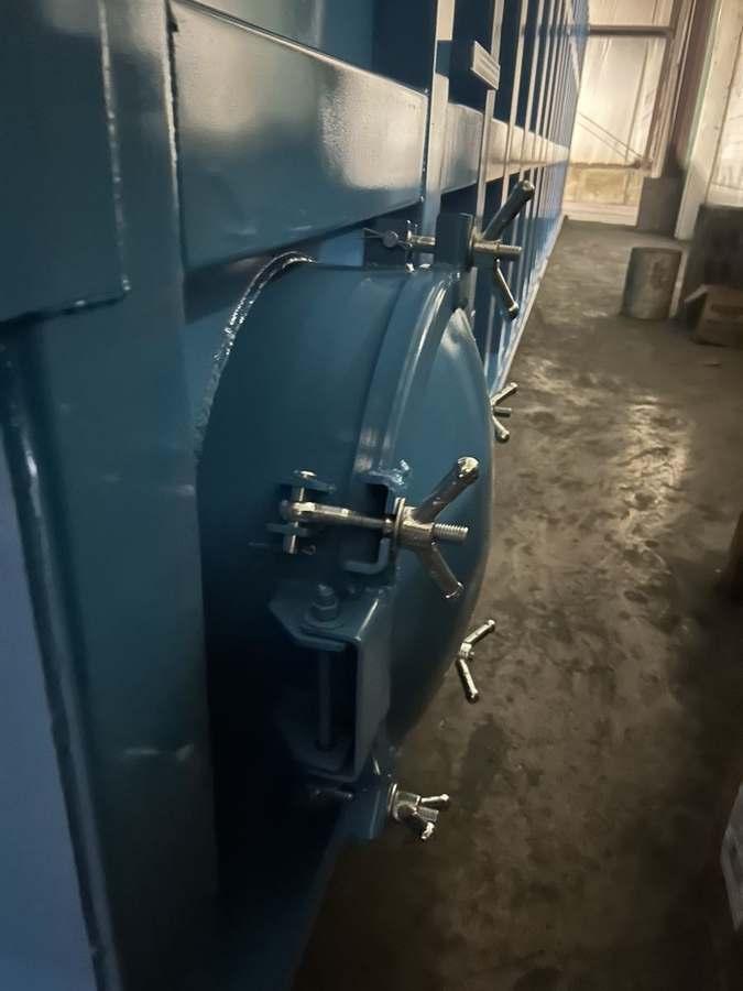EnviroBox manway — bolted access hatch with davit arm